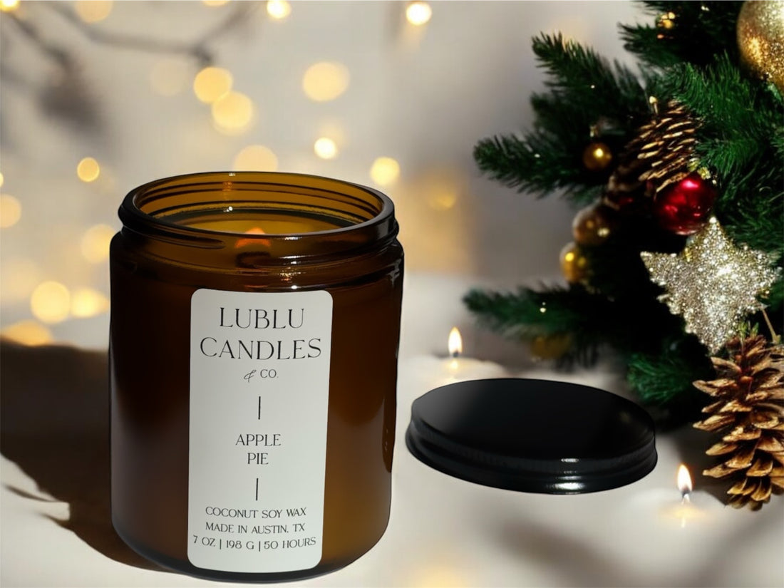 candle in a glass jar with Christmas background