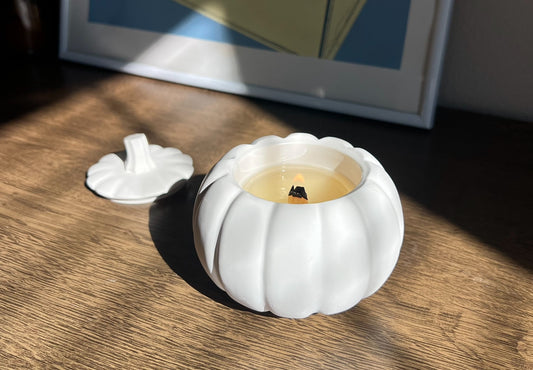 white pumpkin candle