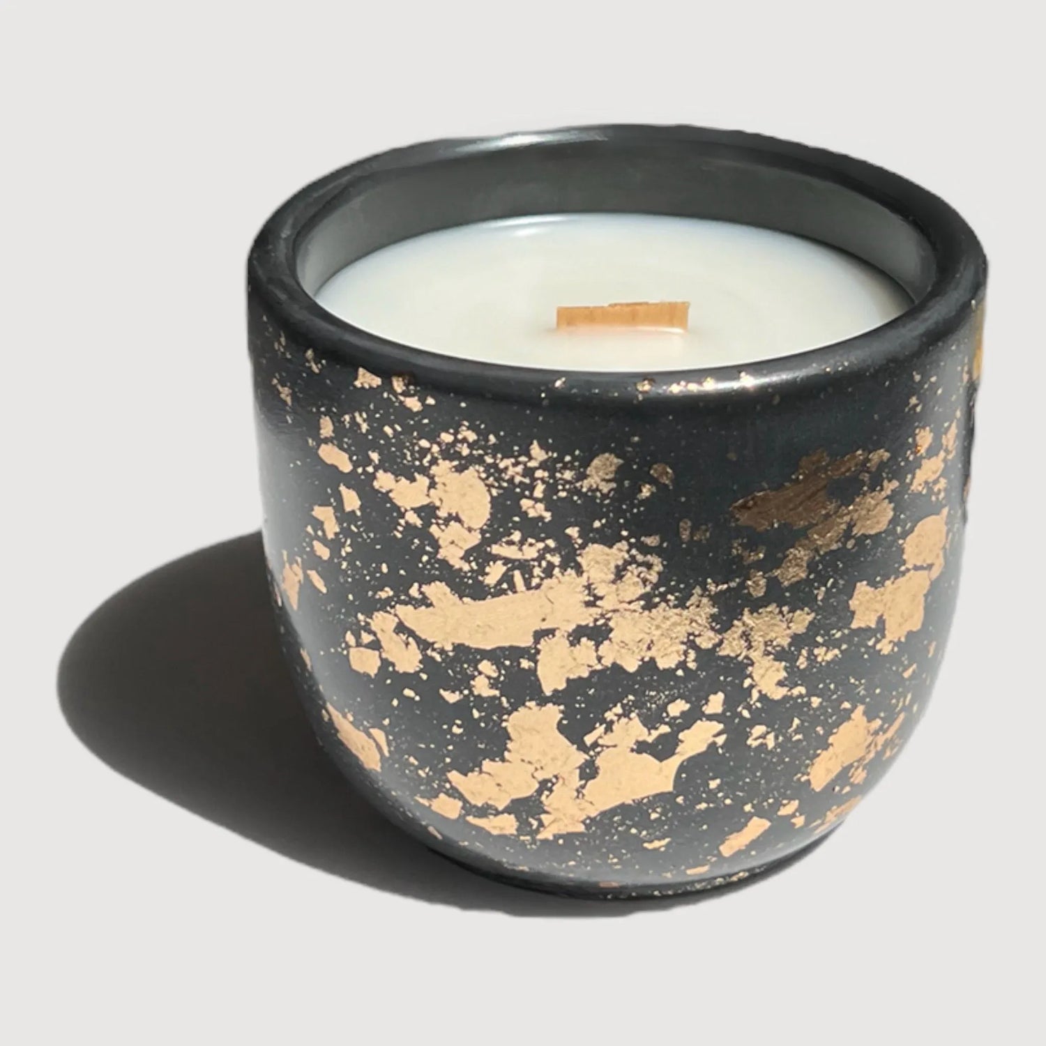 black and gold candle